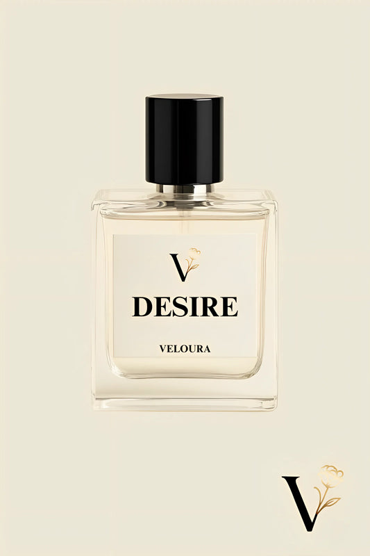 Perfume bottle labeled 'Desire' by Veloura on a beige background