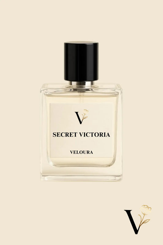Perfume bottle labeled 'Secret Victoria Velour' on a beige background